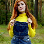 Third pic of Redhead Jia Lissa strips outdoors as she displays her trimmed pussy. naked