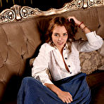 Third pic of Top model Maxa bares her sexy tanned body and smooth pussy on the couch. naked