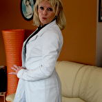 First pic of Horny blonde housewife getting naughty on the couch - GrannyPornPics.net