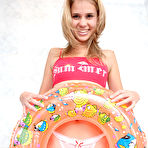 Second pic of This charming blonde chick is afraid to swim in her bath without life buoy, so she takes it with her to have a hot crazy bath. free pictures