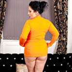Second pic of Big breasted MILF with red lips showing off her curvy ass - Free Mature.nl gallery