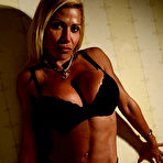 First pic of Stacked muscle blonde Flavia Crisos with bra busting boobs poses in black lingerie