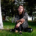 Third pic of Russian Smokers | Pretty faced Asya is smoking a cigarette outdoors