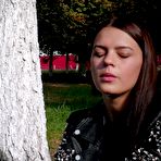 Fourth pic of Russian Smokers | Pretty faced Asya is smoking a cigarette outdoors