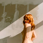 Third pic of Eve Harper peels off her red lingerie in front of a mirror