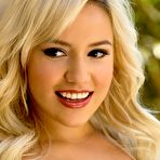 Third pic of Busty hot blonde Kylie Page sexily undresses at the backyard - Digital Desire Babes