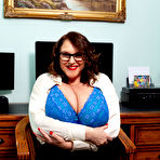 Second pic of Huge breasted secretary Carol brown is horny at work - Free Mature.nl content