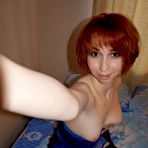 First pic of Beautiful redhead knows how to highlight her goods at HomeMoviesTube.com