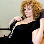 First pic of Young Cris is having BIG trouble with his hot big breasted MILF boss! - Mature.nl