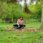 Third pic of Miss Nica Nordic Fetishclips | Rubber boot mistress presses slave face into manure
