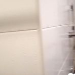 First pic of Tattooed redhead touches herself in the bathroom - AmateurPorn