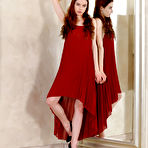 First pic of Loren Sun peels off her elegant red dress in front of the full length mirror