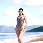 Second pic of Irina Sivalnaya peels off her bathing suit on an exotic island
