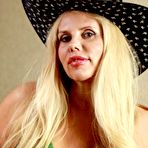 Fourth pic of Mature blonde Karen Fisher sets her huge boobies and clean-shaven cooter loose of costume play apparel | NakedWomenPhotos.net