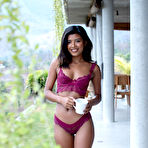 Second pic of Moana Rosi sips her morning tea and strips among exotic plants
