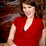 Second pic of Tattooed amateur uncovers her fur covered underarms and pubic hair as she takes off her dress | NakedWomenPhotos.net