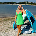 First pic of See voyeur MILF Beth show off her hairy pussy at the beach - Mature.nl