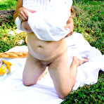 Second pic of Hairy Busty Tina loves to get wet outside in the grass - Mature.nl