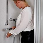 First pic of AllSensual | Blonde Frida takes a shower in her white shirt and black glossy pants