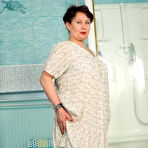 First pic of Modern Grandma Nata loves to play with her dildo and her pussy in the bathroom - Mature.nl