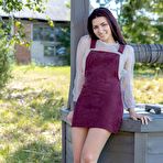 First pic of Nana O is swinging naked out of her purple dress at the foot of a fountain