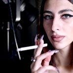 Third pic of Russian Smokers | Arina is smoking two all white cigarettes in the studio