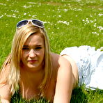 Third pic of Holly strips off topless. 