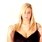 First pic of Hcupholly is wearing a. 