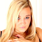 Second pic of Hcupholly is wearing a. 