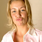 Third pic of Naughty Mag - Suzi - Suzi, a cute blonde coed, rides a dildo in the bathroom.