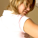 Fourth pic of Naughty Mag - Suzi - Suzi, a cute blonde coed, rides a dildo in the bathroom.