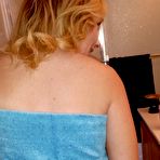 Second pic of Mature blonde babe poses for local photographers and shows off her ass 15 photos