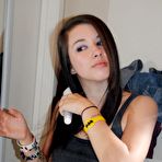 Second pic of Tattooed brunette girl showing her ass in a mini skirt 15 photos