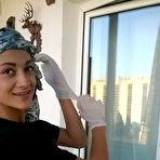 Fourth pic of Gorgeous girl showing her nice ass while cleaning the window 15 photos