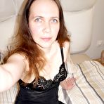 First pic of Hot mom teasing in her black stockings at HomeMoviesTube.com