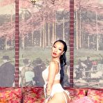 First pic of The sensual Asian MILF Asa Akira teases you while undressing herself on the couch