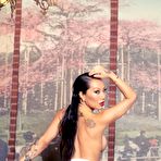 Second pic of The sensual Asian MILF Asa Akira teases you while undressing herself on the couch