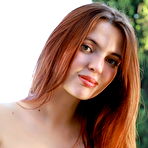 First pic of Cute Redhead Felicia Vina plays with her trimmed pussy on the couch outdoors