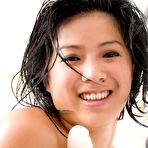 Third pic of Naked Asian girl pleasuring her pussy with a big dildo in her bathroom