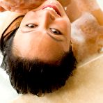 Second pic of Beautiful Asian girl posing nude in her bathroom while taking a bubble bath
