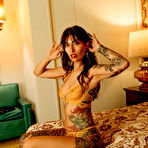First pic of Dallas E Maxwell exposes her inked body in the motel room