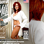 Fourth pic of Sexy redhead MILF Andi James playing with her wet pussy in the shower - Mature.nl