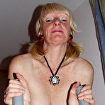 Third pic of Blonde mature woman does a naked workout and makes herself wet - Mature.nl