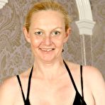 First pic of Mature blonde amateur Suzie Stone exposes her big boobs and rides a toy - NakedPics