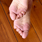 Second pic of Amateur babe with a nice bosom Shirley Sweet strips and sucks her own toes - NakedPics