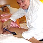 Second pic of BBW Grandma Libby Ellis sites with her legs open so Doctor can inspect her shaved wet cunt &ndash; UK Wives Pics