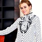 First pic of Nancy Acty Strips in a Red Chair