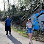 Second pic of Amateur Milf in a long trench coat flashes her huge tits and shaved twat in Weddington Walk &ndash; Bare Milfs