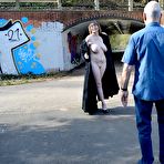 Fourth pic of Amateur Milf in a long trench coat flashes her huge tits and shaved twat in Weddington Walk &ndash; Bare Milfs