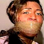 Third pic of tied-and-gagged.com | 27 Yr OLD BEAUTY SALON OWNER IS HOG-TIED, BAREFOOT, TOE-TIED, DOUBLE WRAP TAPE GAGGED, ASS SPANKED AND FOOT TICKLED (D75-3)